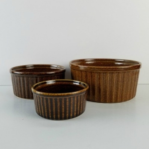 set of three brown ribbed bowls