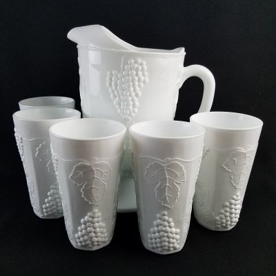 https://beckalar.com/wp-content/uploads/2021/09/milk-glass-grape-pattern-pitcher-set-rotated.jpg