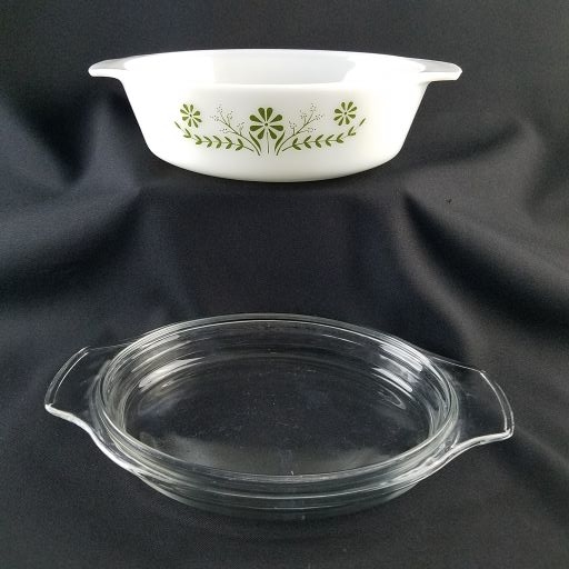 https://beckalar.com/wp-content/uploads/2022/01/milk-glass-green-daisy-casserole-dish1-rotated.jpg